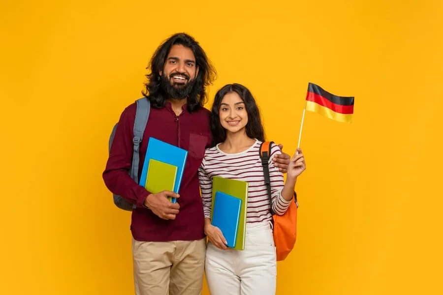 Smiling Indian Man Woman Students Showing Flag Germany 116547 - YES Germany